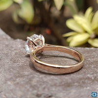 Round solitaire engagement ring crafted with elegance and a sleek finish.