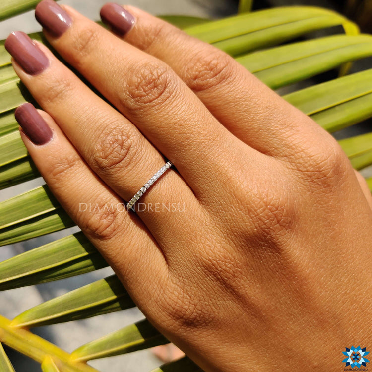 Radiant moissanite round band that catches the light beautifully, offering eternal sparkle.