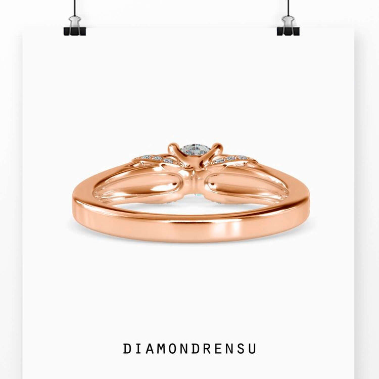 Lab grown diamond engagement ring with side stones and a four
prong setting