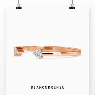 Open wedding band with round cut diamonds, a perfect unique wedding accessory.