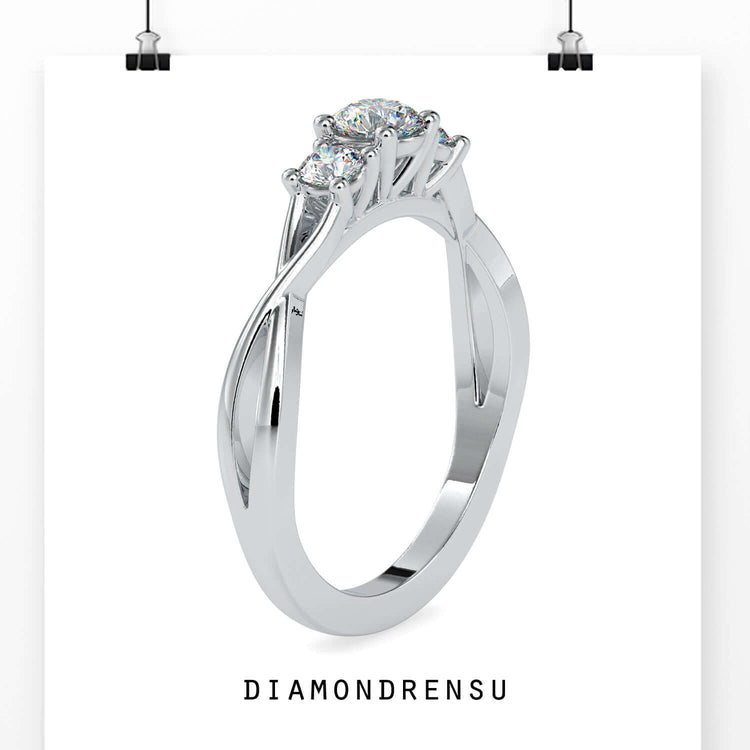 Three stone engagement ring with a twisted diamond ring band, crafted by DiamondRensu.