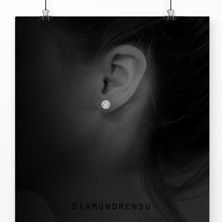 Classic bezel set diamond earrings, crafted with IGI certified Lab Grown Diamond.
