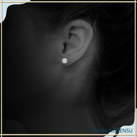 Classic diamond earrings studs featuring a 4 prong basket setting for secure wear.
