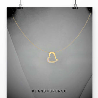 The heart shape diamond pendant shines with brilliant sparkle.