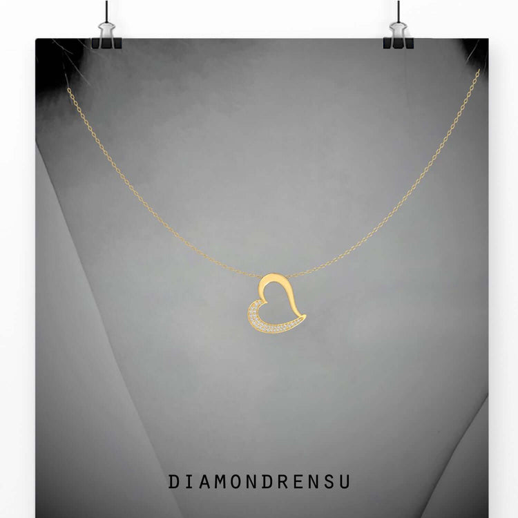 The heart shape diamond pendant shines with brilliant sparkle.
