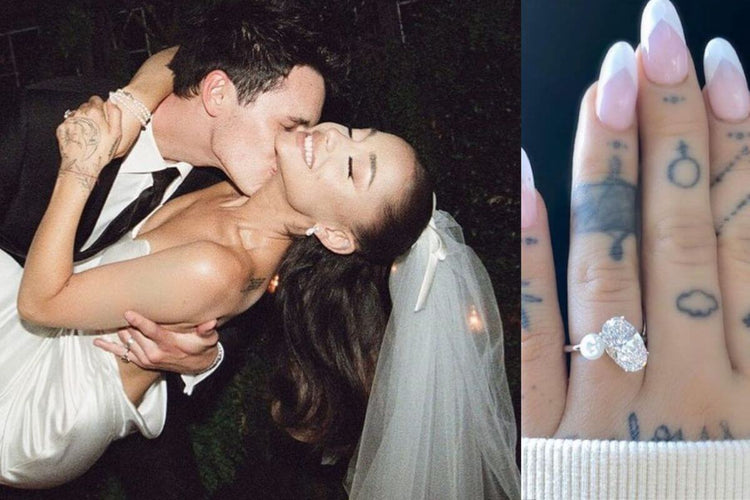 Ariana grande showing her engagement ring