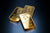 Gold bars with their hardness written on them