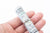 A ten thousand dollar bundle roled within the diamond ring.