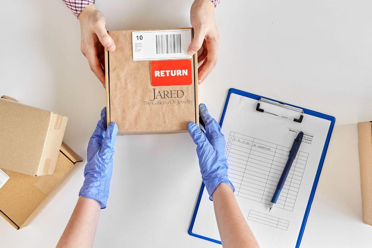 A guy returning his jared parcel back.