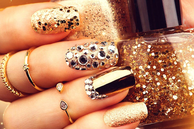 Showing Nail art and diamond rings on hand