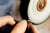 A guy polishing a diamond ring