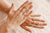 Woman Wearing Rings on Different Fingers in both hands showcasing Symbolism