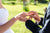 Lady wearing ring on right hand ring finger at her engagement ceremony