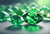 Two lab created emerald diamonds close up view