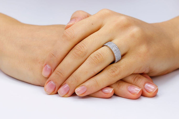 Close up of female hands with an Eternity band
