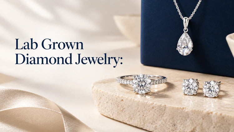 Lab grown diamond jewelry with ring, earrings, and pear-shaped pendant