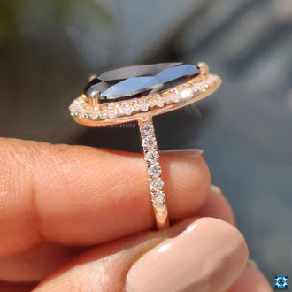 Rose gold engagement ring provides a warm, refined finish.
