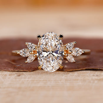 Oval Diamond Engagement Ring with a hidden halo design.
