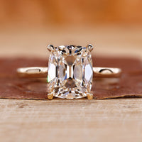 Old mine cushion cut diamond in claw prong setting.