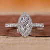 Marquise diamond ring with a diamond round cut shines brightly.

