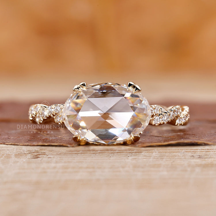 Double claw prong setting enhances the beauty of this custom engagement ring.
