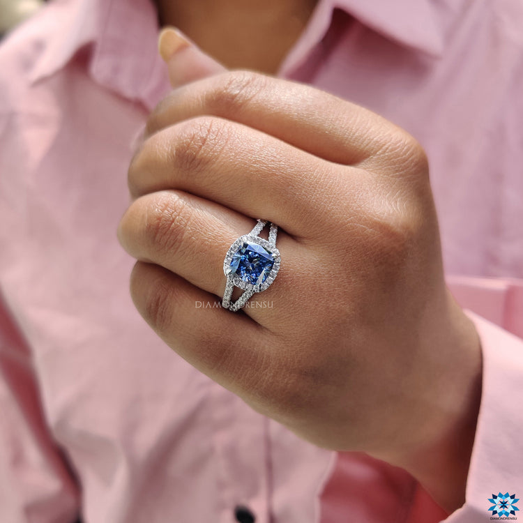 Pave split shank setting featured in white gold engagement ring.
