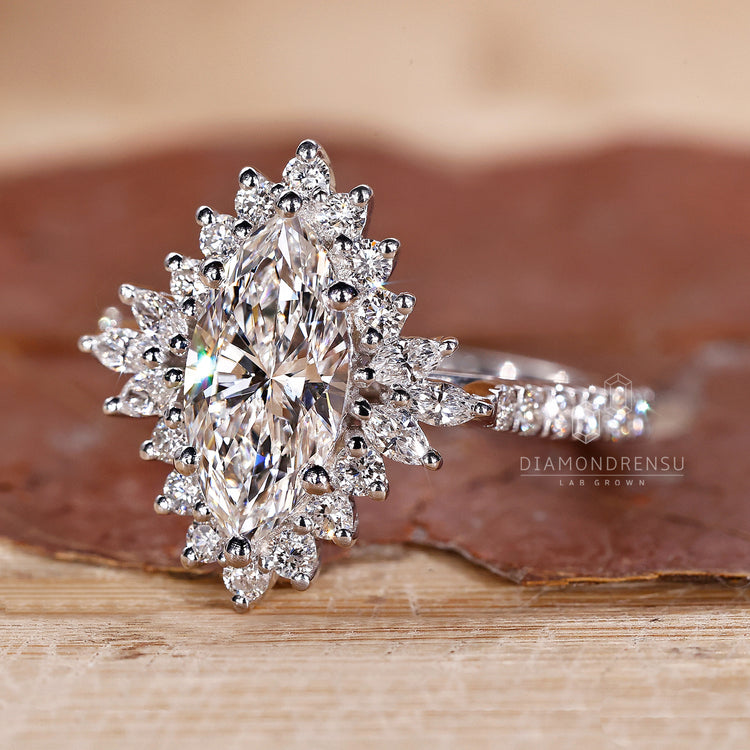 Beautiful white gold diamond rings featuring marquise cut stones.
