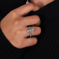 Pave Diamond Ring with a radiant round diamond centerpiece.
