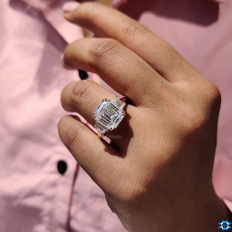 Diamondrensu engagement ring with a fishtail prong setting for moissanite.
