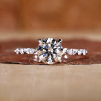 Round Cut Engagement Ring featuring a timeless design.

