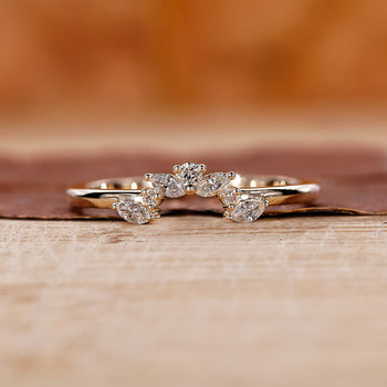 Tiara wedding band with elegant design.
