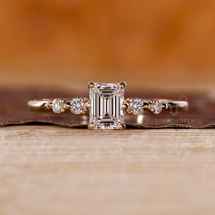 Four round prong setting diamond ring.
