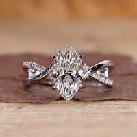 marquise diamond engagement ring, pave diamond ring band, claw prongs
