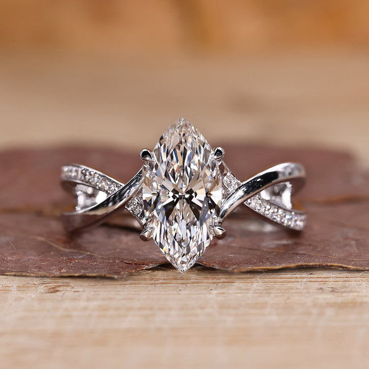 marquise diamond engagement ring, pave diamond ring band, claw prongs
