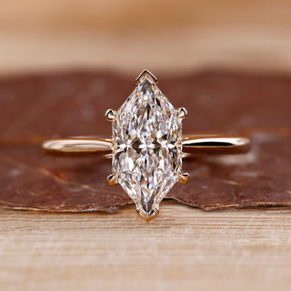 Dutch marquise engagement ring with tapered shank ring.
