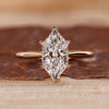Dutch marquise engagement ring with tapered shank ring.
