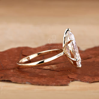 Gold Solitaire Engagement Ring with a classic and modern touch.
