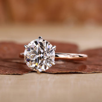Round Diamond Solitaire Engagement Ring in elegant setting.
