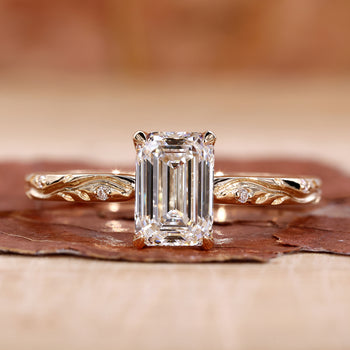 Three Stone Diamond Ring with brilliant center and side stones.
