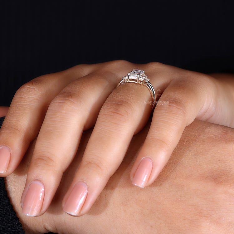 Emerald and Baguette Cut Diamond Ring for refined elegance.
