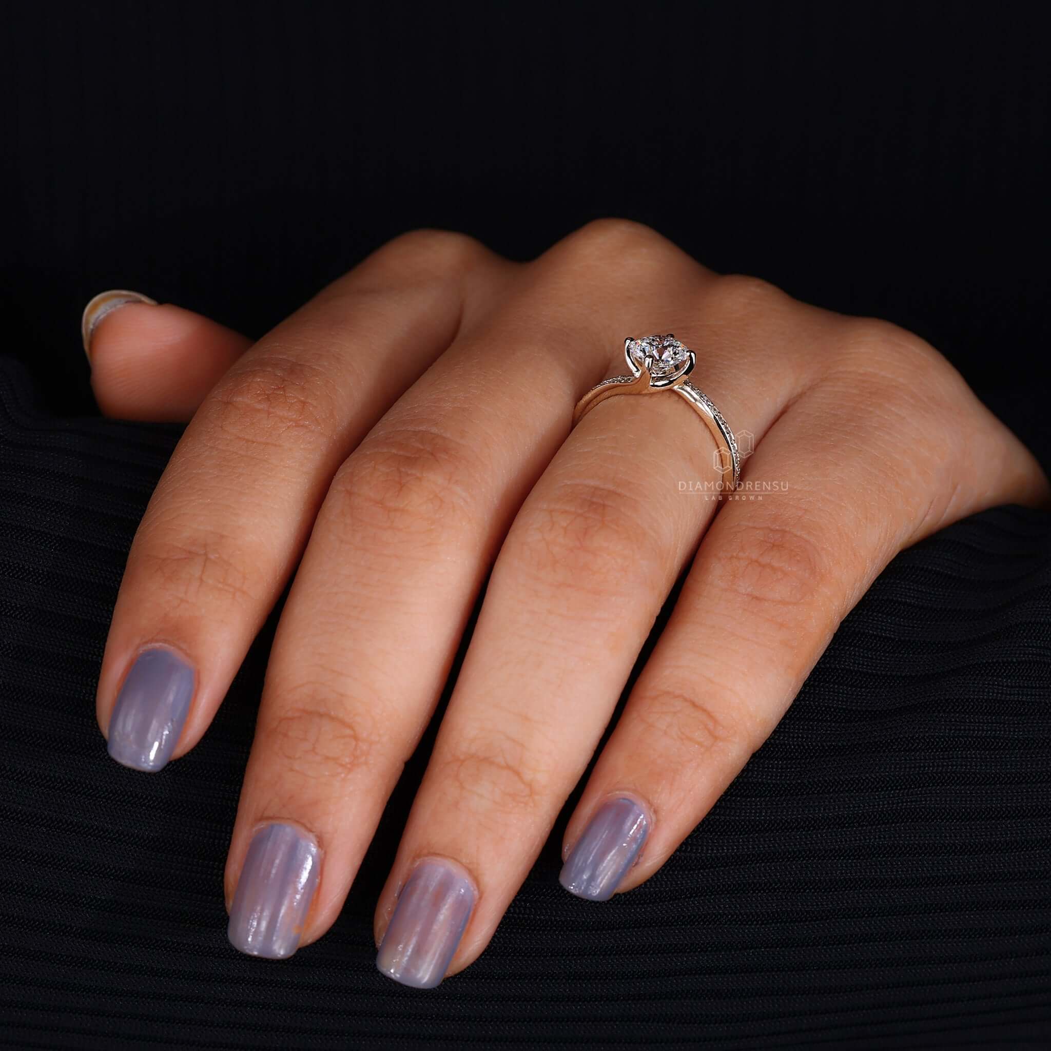 Exquisite bypass ring setting on hand, displaying its unique crossover design.