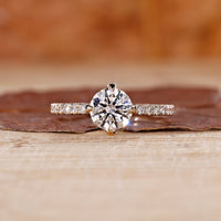 Round Cut Diamond Ring with a brilliant sparkle in a prong setting.
