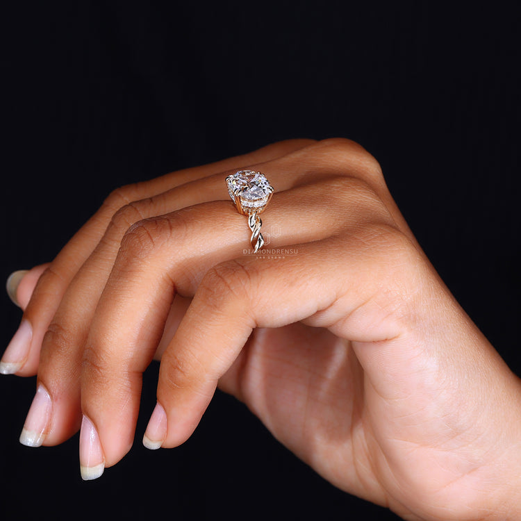 Round Diamond set in a double claw prong engagement ring for secure placement.
