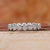 Bezel Set Eternity Band featuring timeless diamond brilliance.
