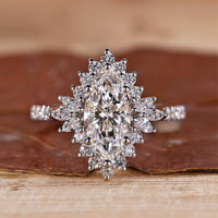 Marquise cut engagement ring set in elegant white gold.
