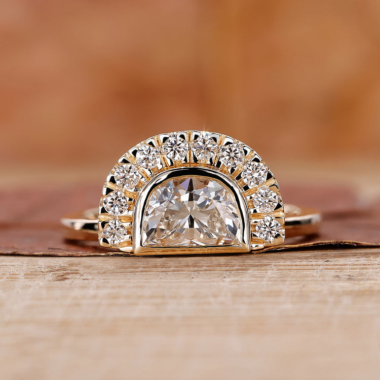 Half moon diamond ring with half halo engagement ring.
