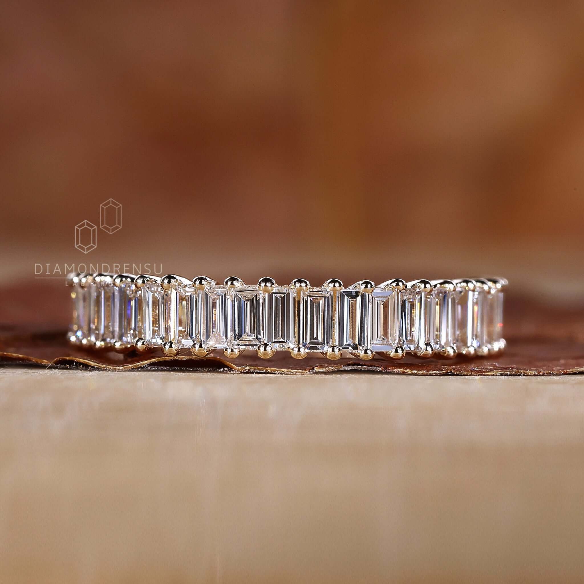 Close-up of a lab diamond half eternity band, highlighting its delicate and refined design