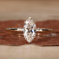 Marquise Solitaire Diamond Ring with a brilliant design.
