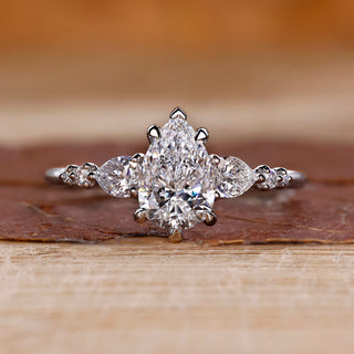 Pear diamond ring in white gold band.
