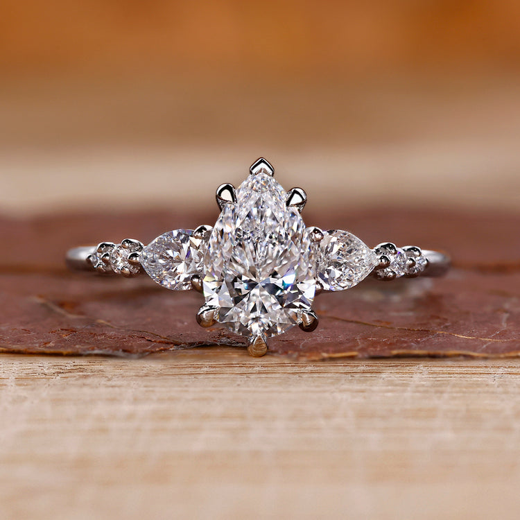 Pear diamond ring in white gold band.
